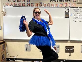 Mrs. Mairs cheering on her class